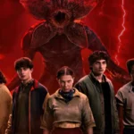 Group of teens standing in front of a giant shadow monster under a red stormy sky in a dark Stranger Things themed scene wallpaper