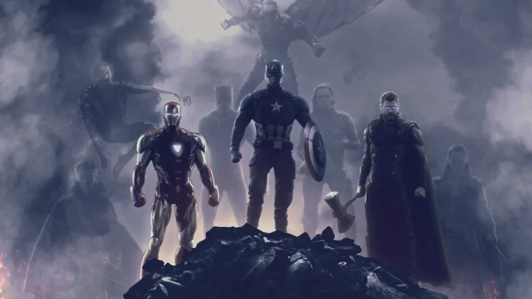 The Avengers team standing united on a smoky battlefield with Captain America, Iron Man and Thor in dramatic cinematic lighting wallpaper