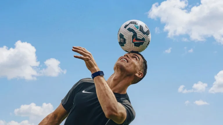 cristiano ronaldo balancing football on head skill outdoor sky soccer athlete wallpaper