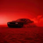 dodge challenger hellcat drifting in red smoke with glowing headlights wallpaper