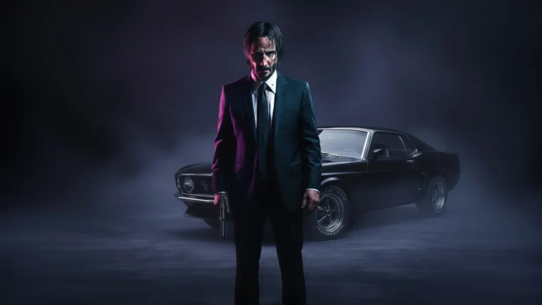John Wick standing with gun in dark suit beside black Mustang cinematic assassin scene wallpaper