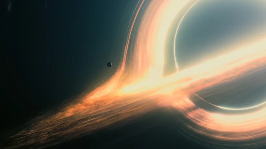 Massive glowing interstellar black hole with swirling orange energy rings and cinematic deep space atmosphere wallpaper