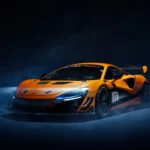 mclaren artura racing edition orange supercar dark background dramatic lighting performance car uhd wallpaper