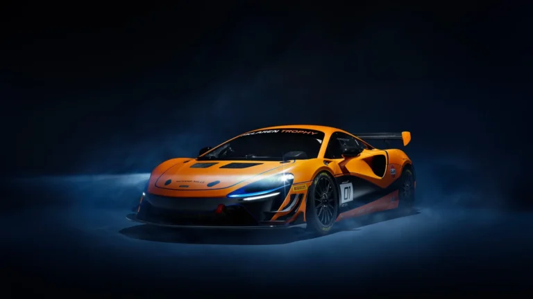 mclaren artura racing edition orange supercar dark background dramatic lighting performance car uhd wallpaper
