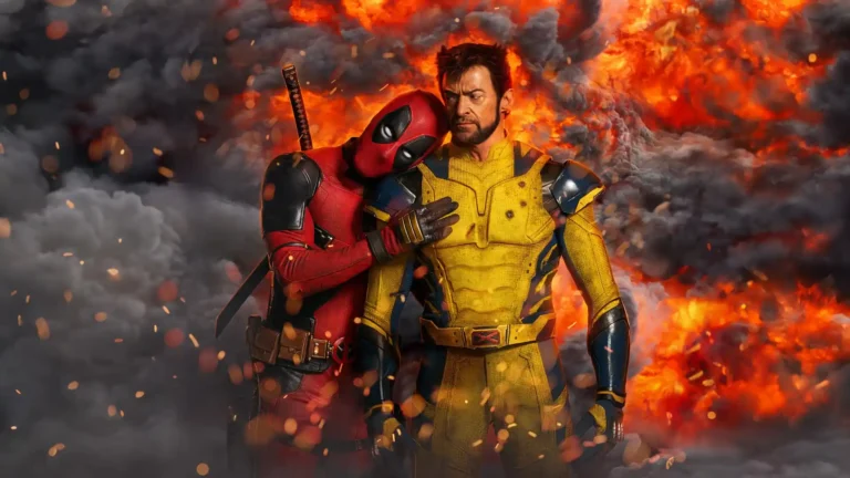 Deadpool and Wolverine standing together in front of a massive explosion in Marvel superhero artwork wallpaper