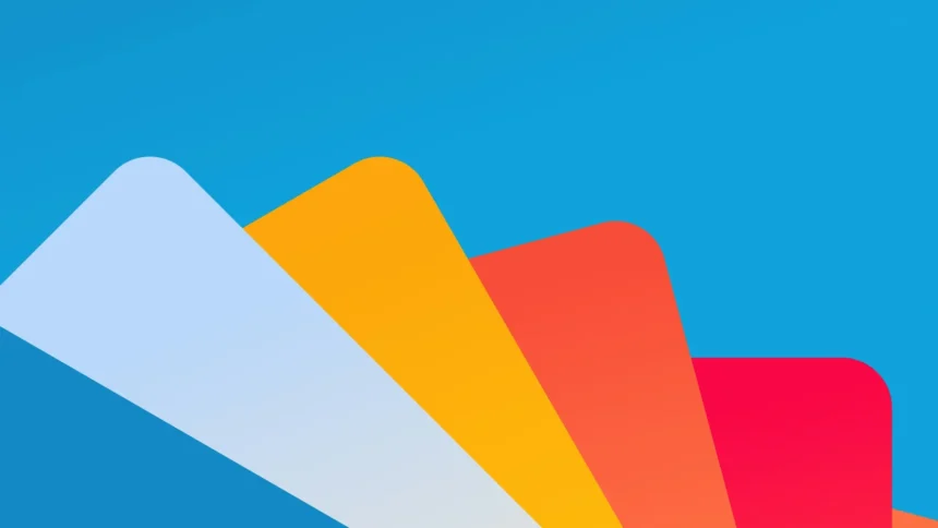 Colorful Google Material Design inspired abstract geometric shapes on blue background wallpaper