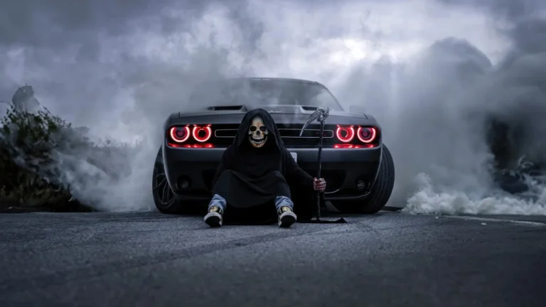 Grim Reaper sitting in front of a Dodge Challenger surrounded by smoke wallpaper
