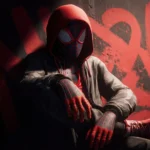 Miles Morales Spider Man in hoodie sitting against urban graffiti wall wallpaper