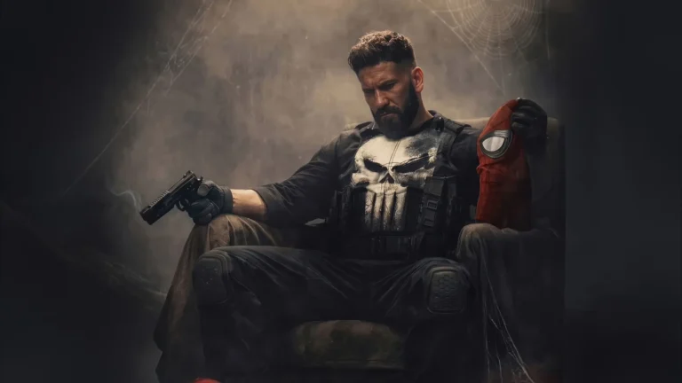 The Punisher holding Spider Man mask in dark room with tactical gear and dramatic lighting wallpaper