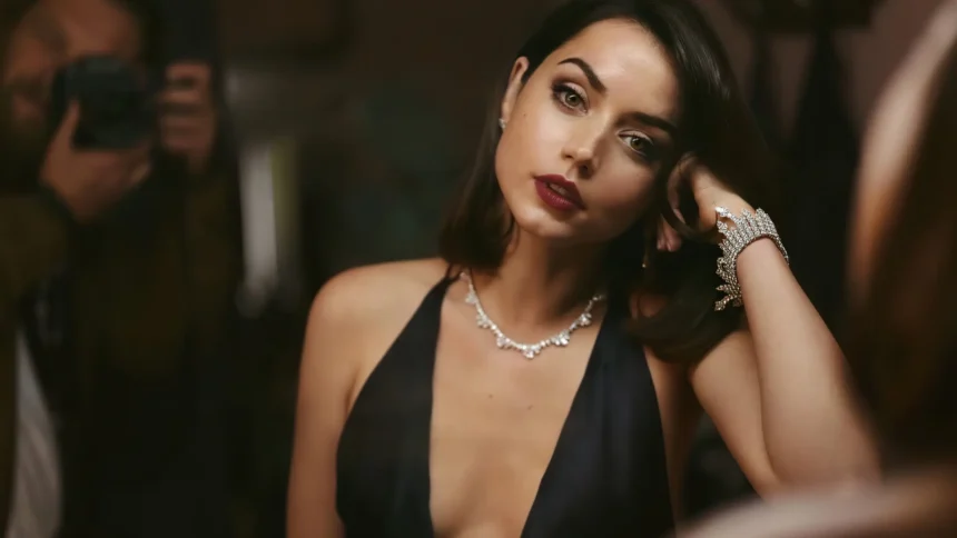 Ana de Armas wearing an elegant black evening gown and diamond jewelry in a No Time to Die inspired Ultra HD wallpaper