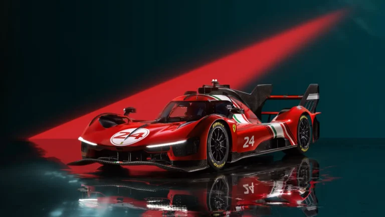 Ferrari 499P Modificata hypercar in red racing livery with dramatic studio lighting in Ultra HD wallpaper