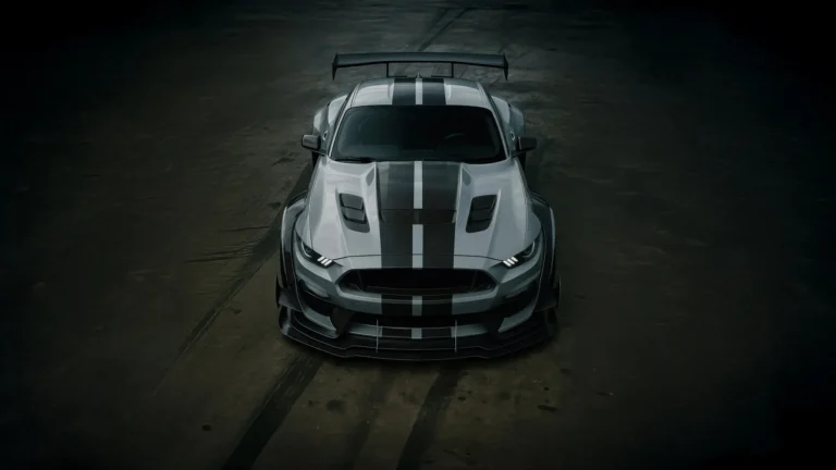 Ford Mustang Shelby GT500 Widebody with carbon fiber hood, racing stripes, and aggressive front view UHD wallpaper