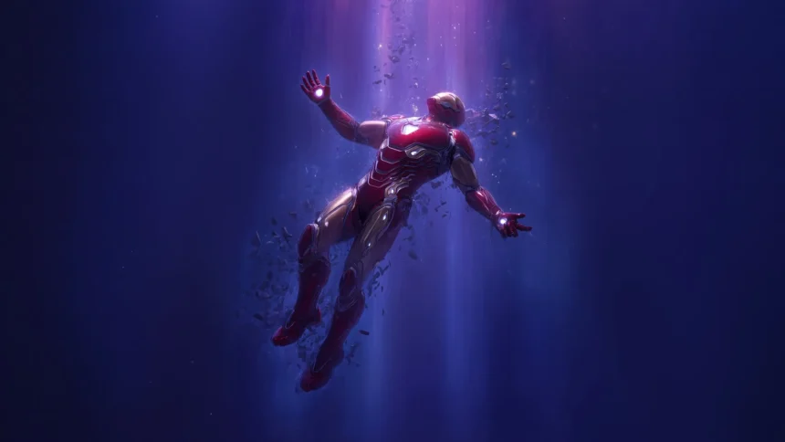 Iron Man floating beneath glowing light in a cinematic Infinity Saga tribute UHD wallpaper