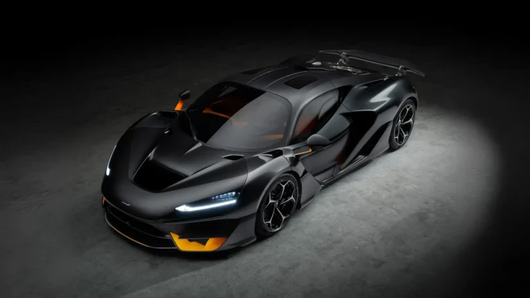 Black McLaren W1 hypercar with carbon fiber body and active rear wing viewed from above UHD wallpaper