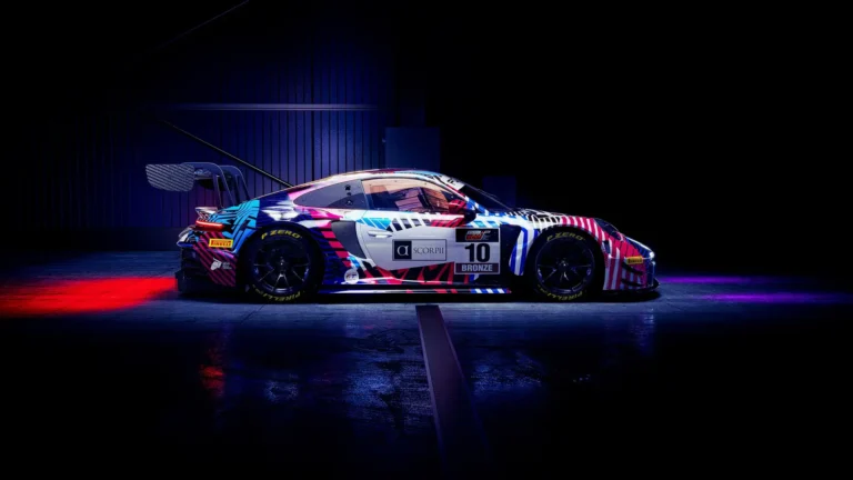 Porsche 918 Motorsport Edition race car with colorful livery under dramatic studio lighting UHD wallpaper