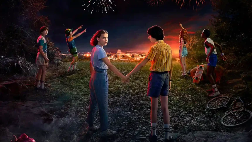 Stranger Things friends standing together at night with carnival lights and fireworks in Ultra HD wallpaper