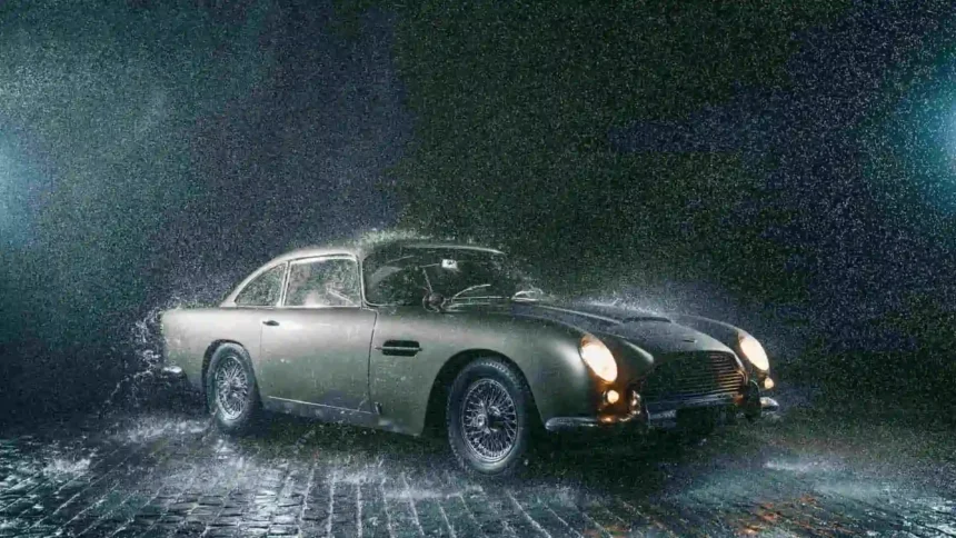 Aston Martin DB5 silver classic car with glowing headlights driving through heavy rain UHD wallpaper
