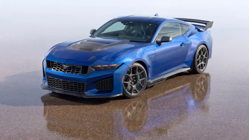 Ford Mustang Dark Horse SC Track Edition in blue with carbon fiber hood, large rear wing, dark wheels, and aggressive racing bodywork wallpaper.