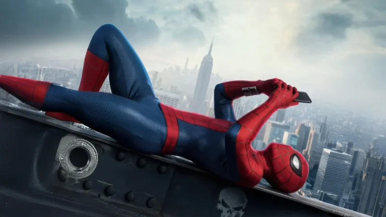 Spider Man Brand New Day relaxing on a New York City rooftop while holding a phone with the skyline behind him wallpaper.