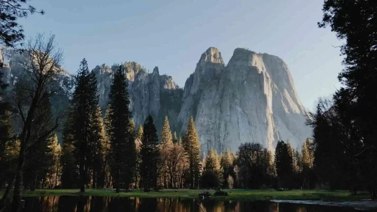 Yosemite Valley mountain view with granite cliffs pine forest and peaceful river in California UHD wallpaper