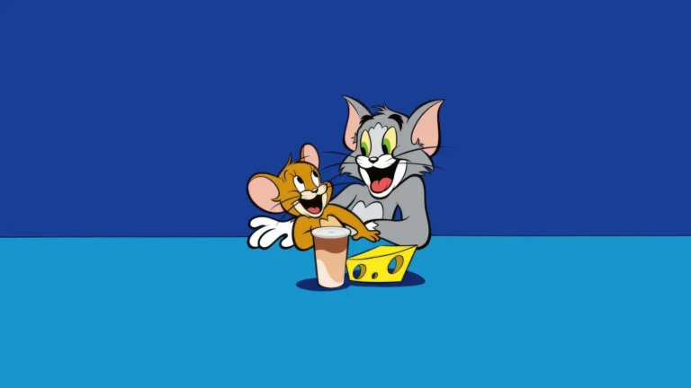 Tom and Jerry laughing together with cheese and a drink on a simple blue background cartoon wallpaper.